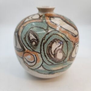 Spherical Glazed Art pottery vase multicolored signed teal orange black